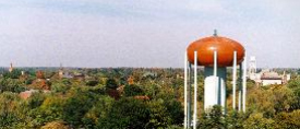 water tower over city trees